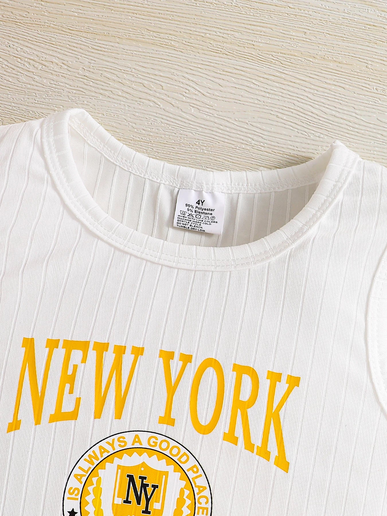 Summer girls' set, breathable and cool solid color short-sleeved T-shirt with letter print and strappy shorts, three-piece set